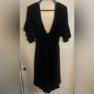 Adorable Black Off Shoulder Romper w/ Ruffle Accents on Sleeves/Shorts & Pockets